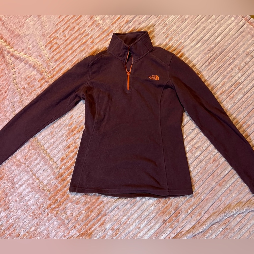 The Northface 1/4 zip. Good used condition size small